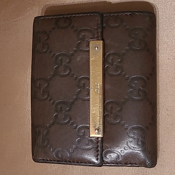 Gucci Handbags - Authentic Gucci dark brown wallet